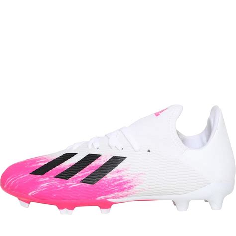 white and pink Adidas boots